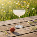 Lychee Blossom with bee above glass
